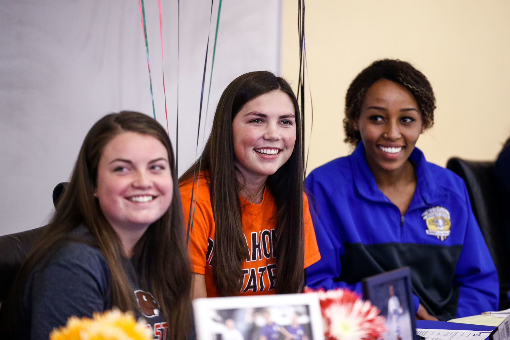 SIGNING DAY: Rampart athletes sign their National Letter of Intent